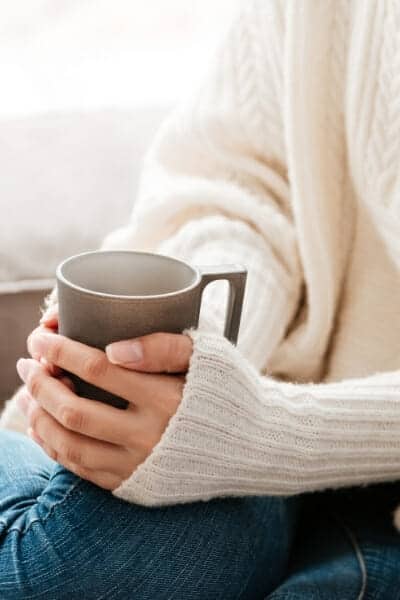 What is slow living, woman drinking coffee